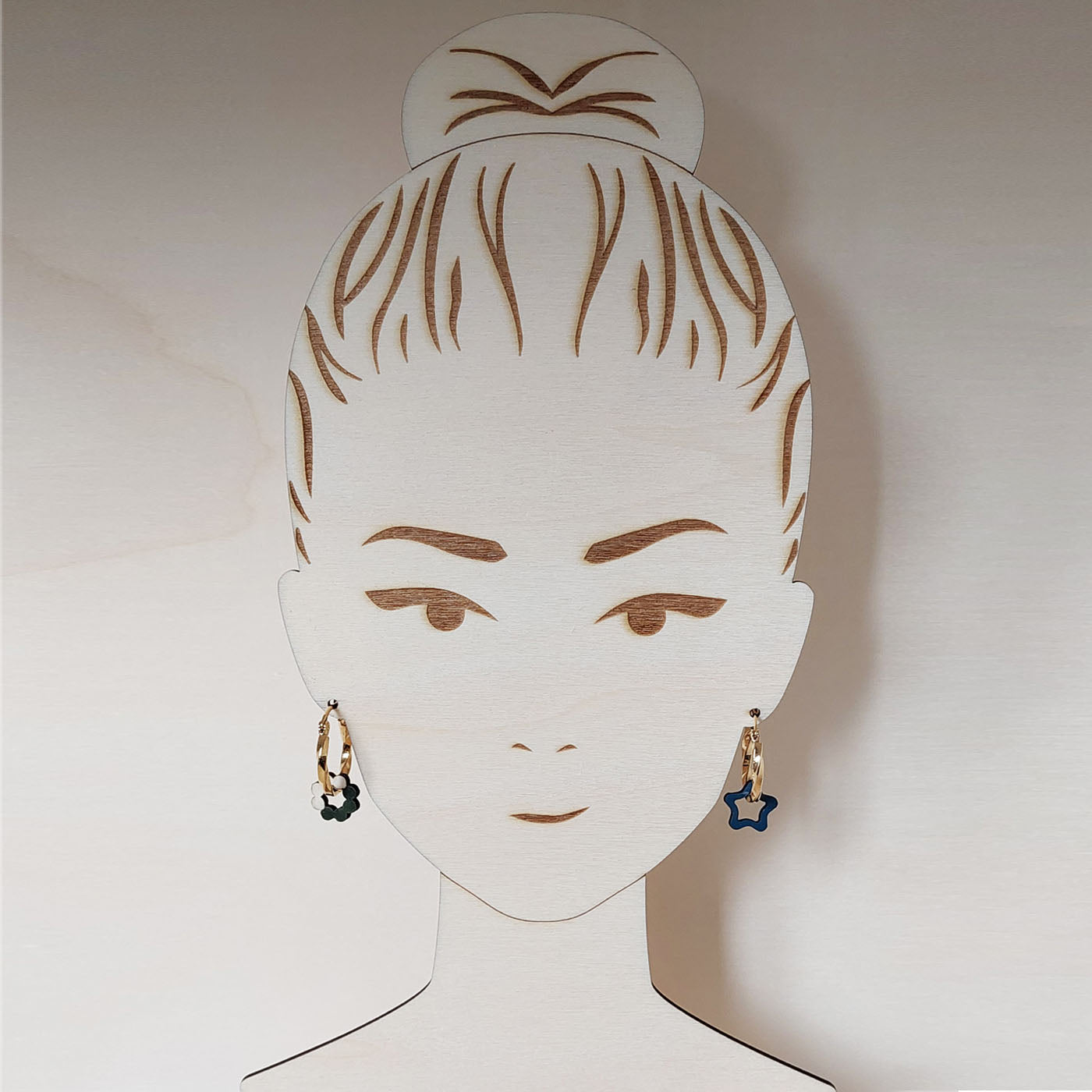 présentoir visage pour une paire de boucles d'oreilles